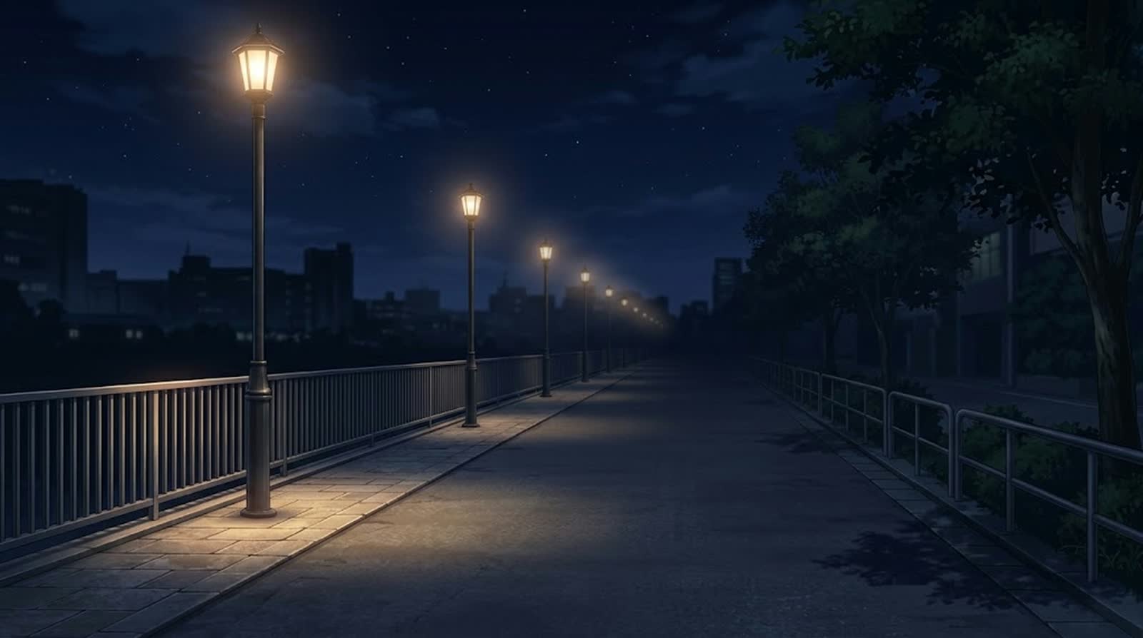 夜の歩道に並ぶ街灯の光